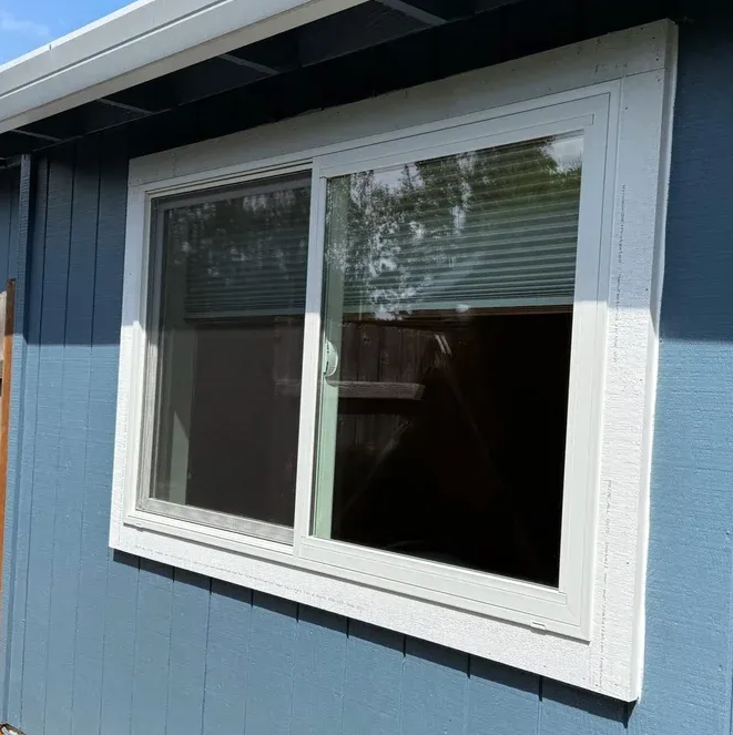 The window was installed and weatherized, then the trim was sealed for a new window replacement.