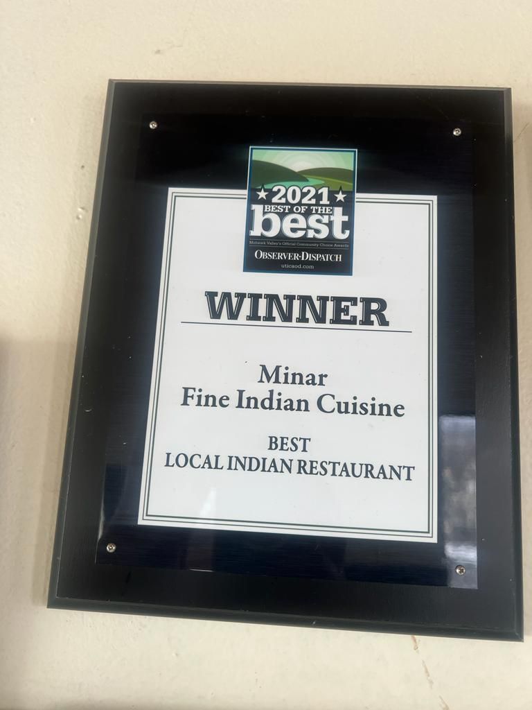 Framed award: Minar Fine Indian Cuisine, Best Local Indian Restaurant, winner of
