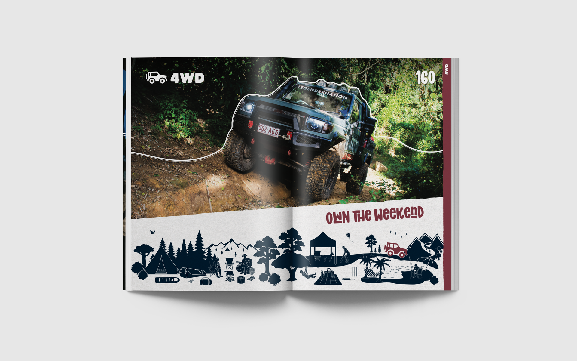 A magazine is open to a page with a picture of a jeep in the woods.
