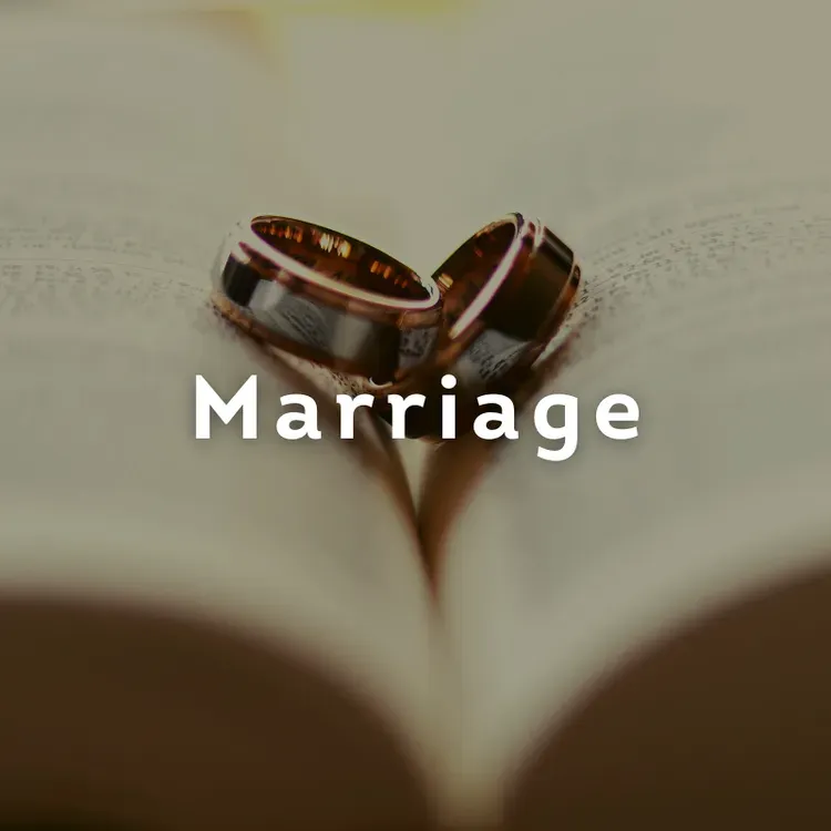 Two wedding rings on an open book with the word “Marriage” overlaid