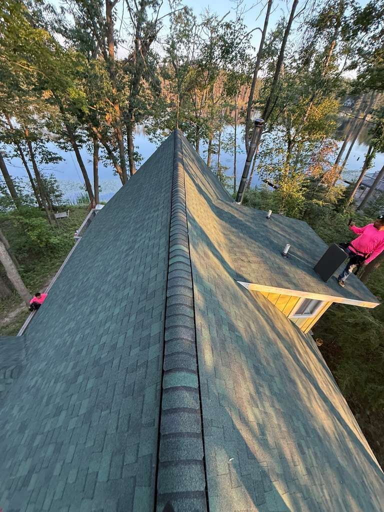 Aerial view of an A-line roof with an asphalt shingle roof installation