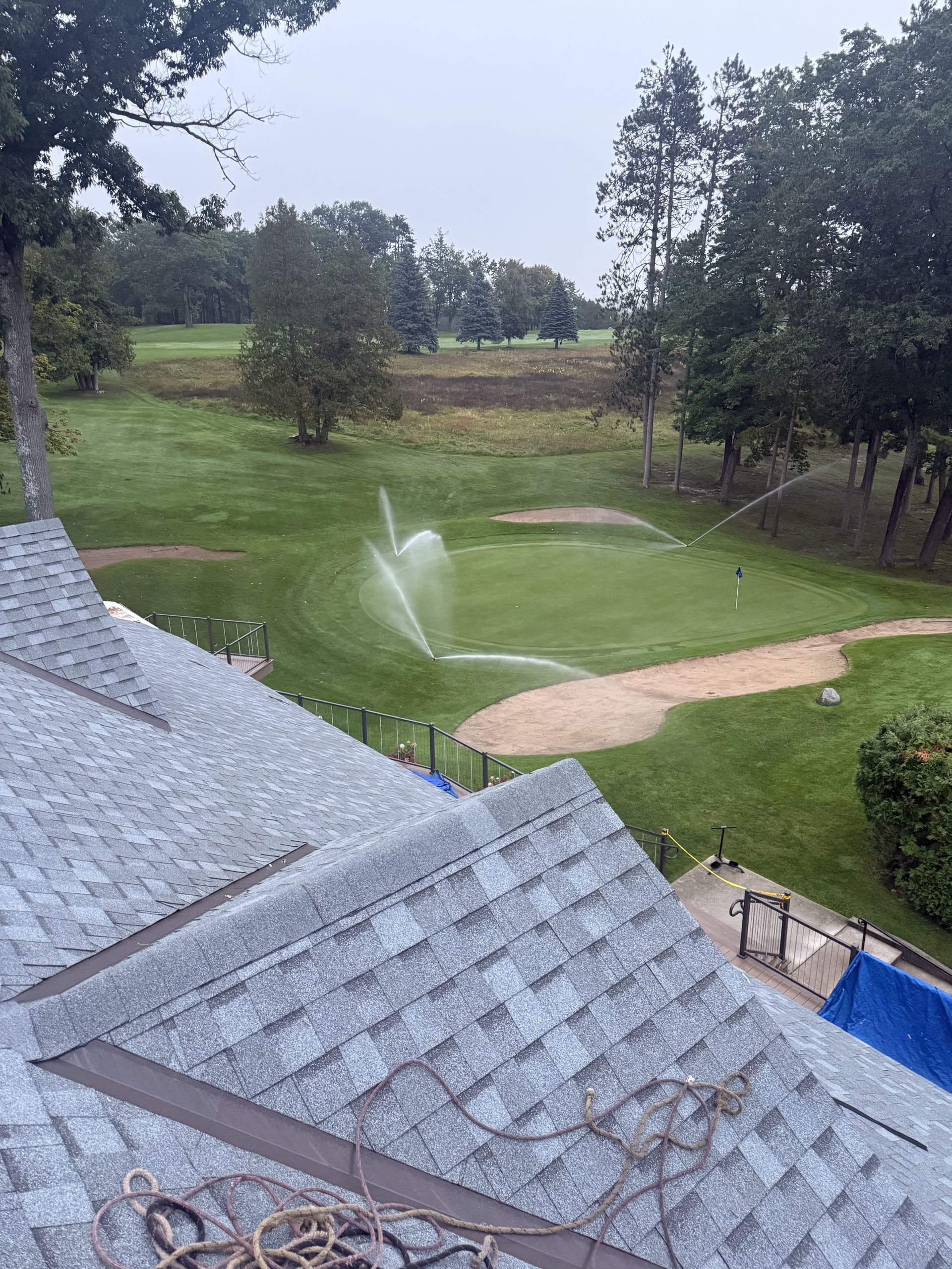 Commercial asphalt shingle roof replacement on Gaylord, MI golf course clubhouse