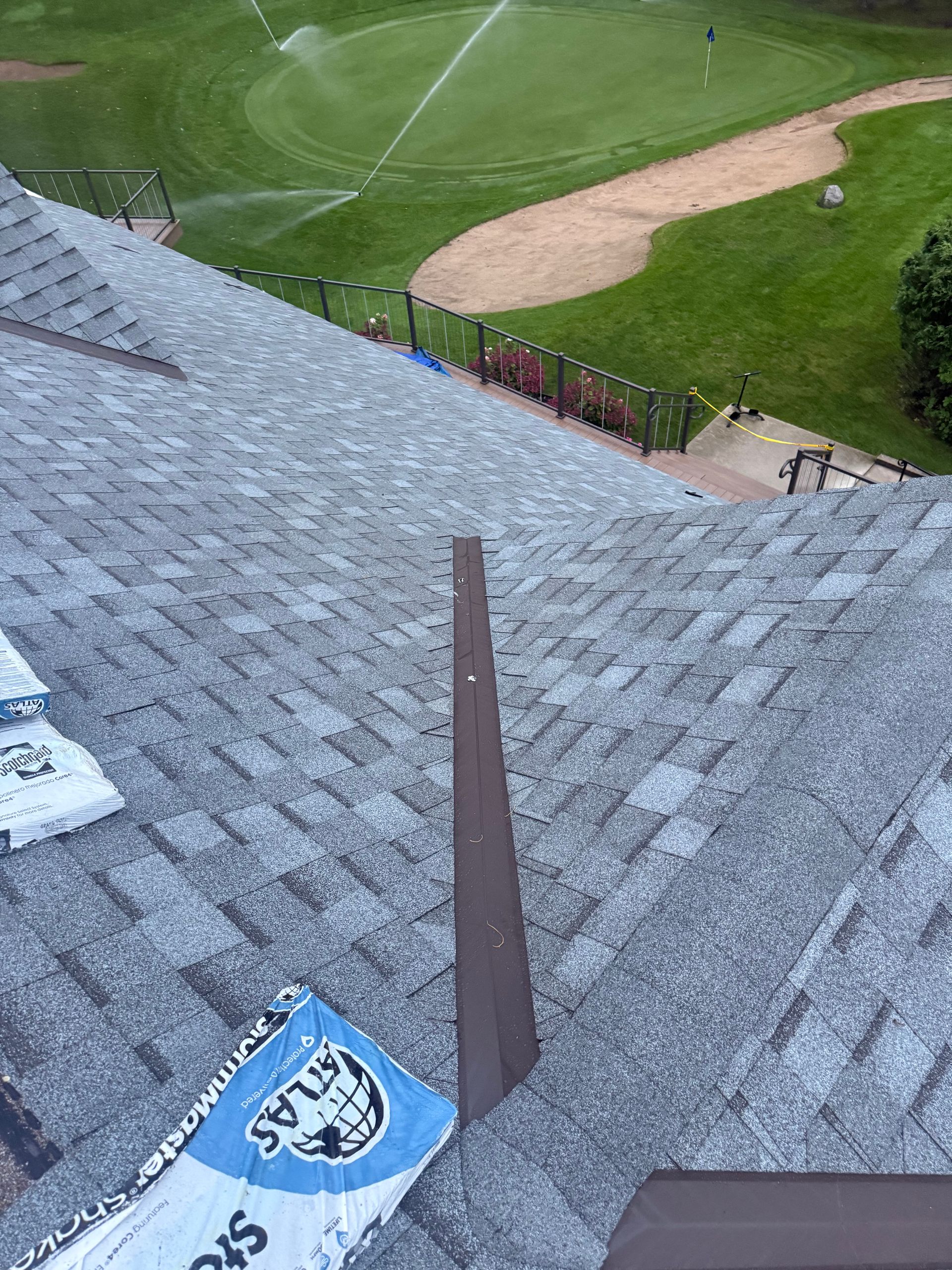 Commercial asphalt shingle roof replacement on Gaylord, MI golf course clubhouse