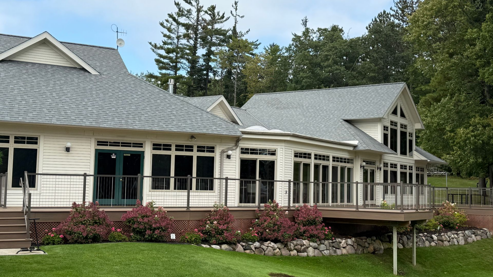Commercial asphalt shingle installation on a golf course's clubhouse in Gaylord, MI