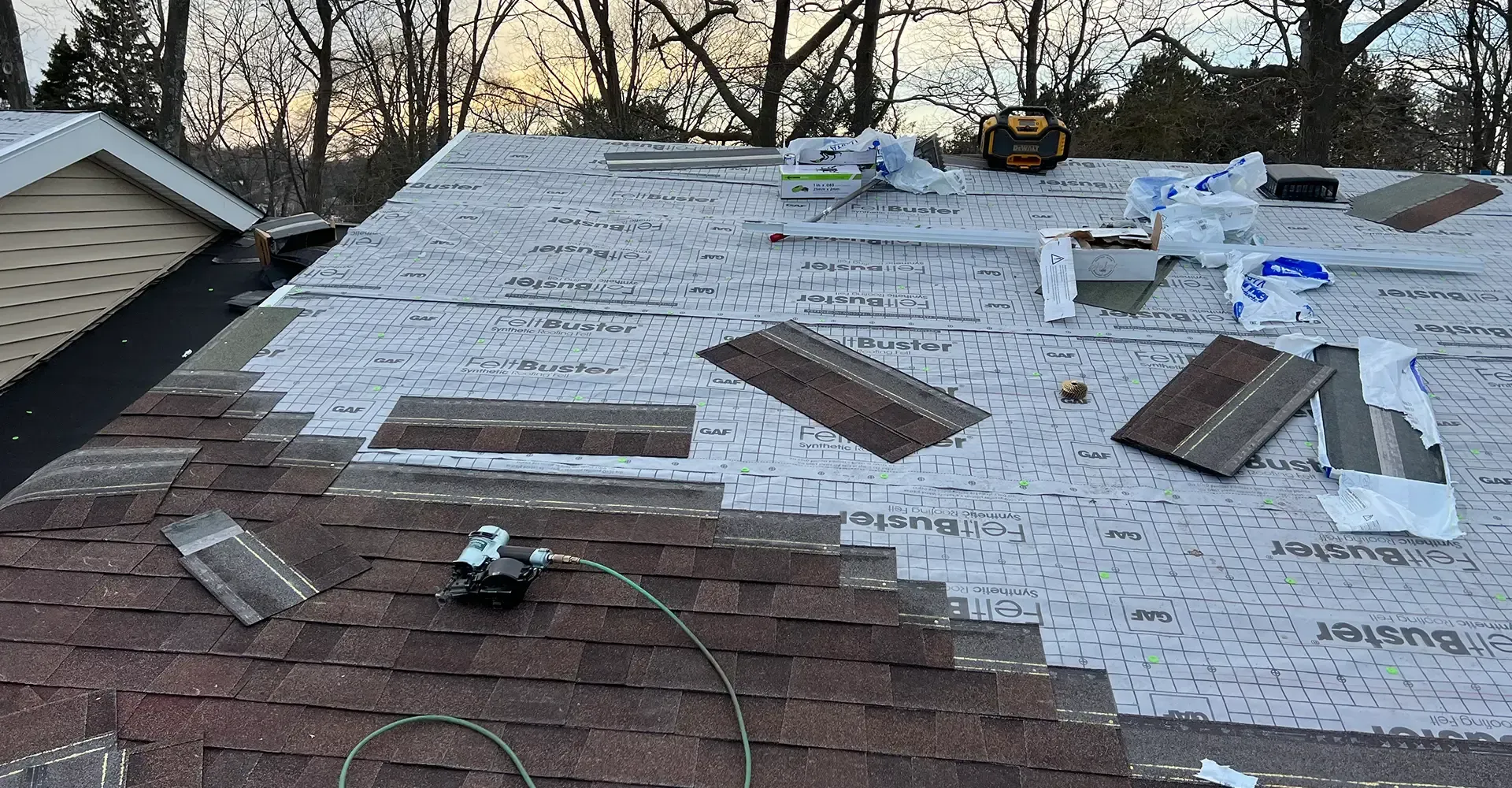 Closeup of an asphalt shingle roof replacement on a two-story home in Gaylord, MI