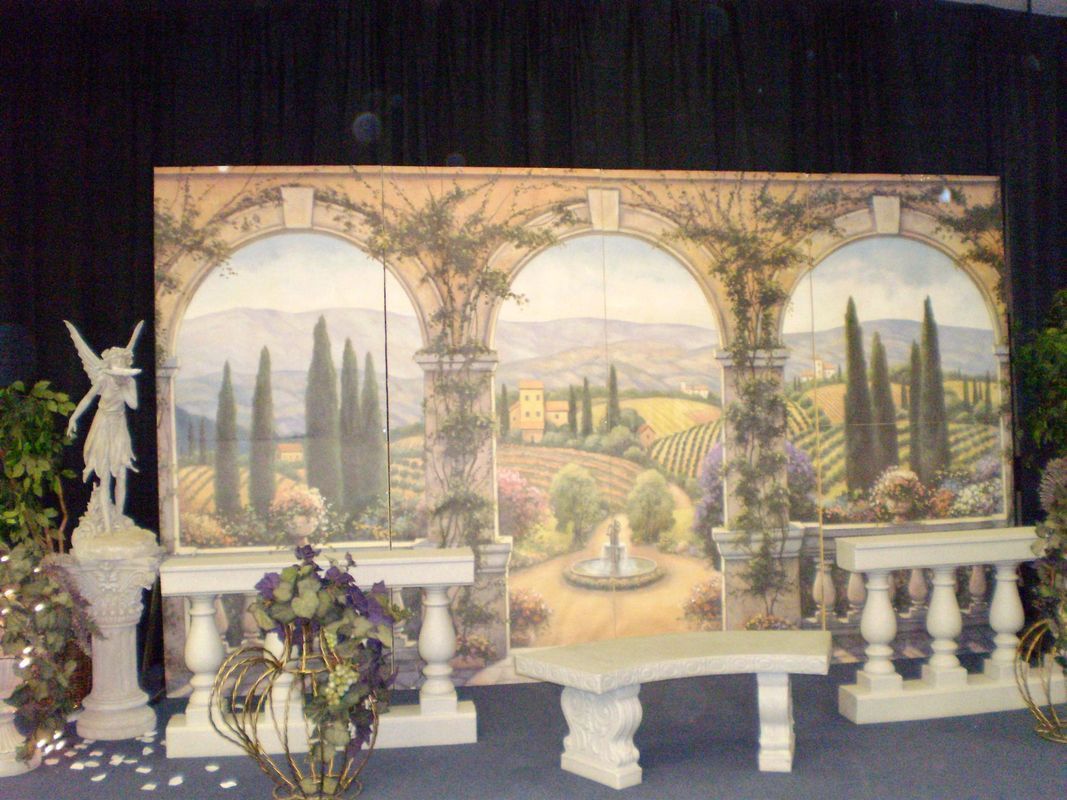 A painting of a landscape with a bench and a statue in front of it