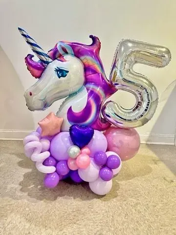 A unicorn balloon arrangement with a