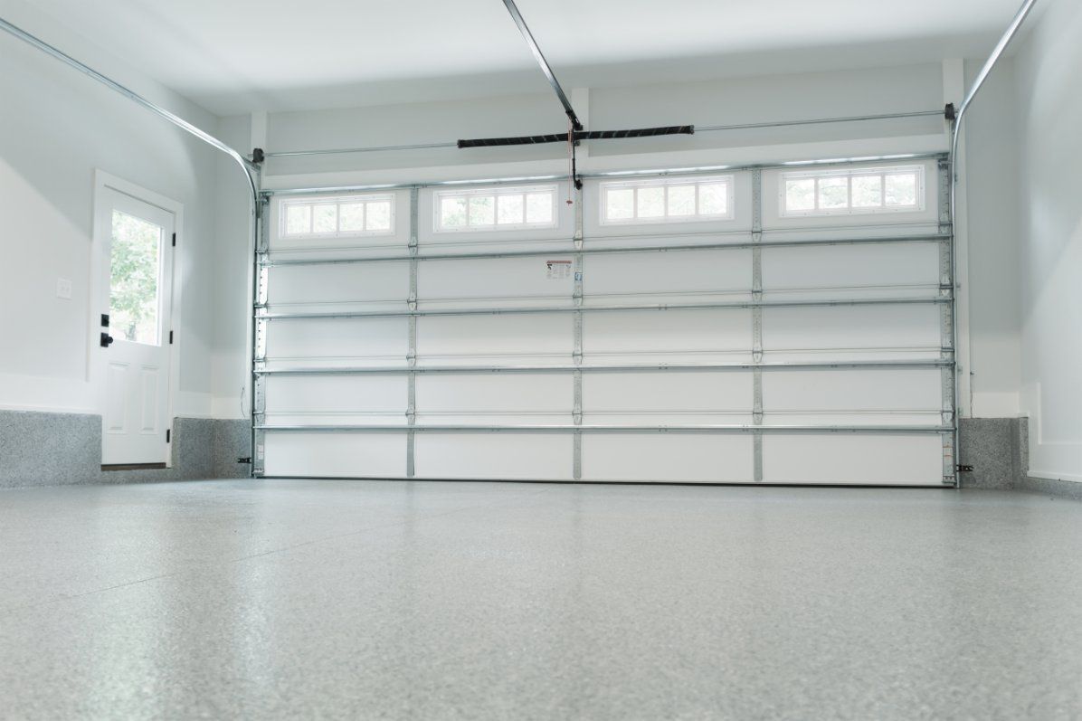 inside view of a garage with white garage door