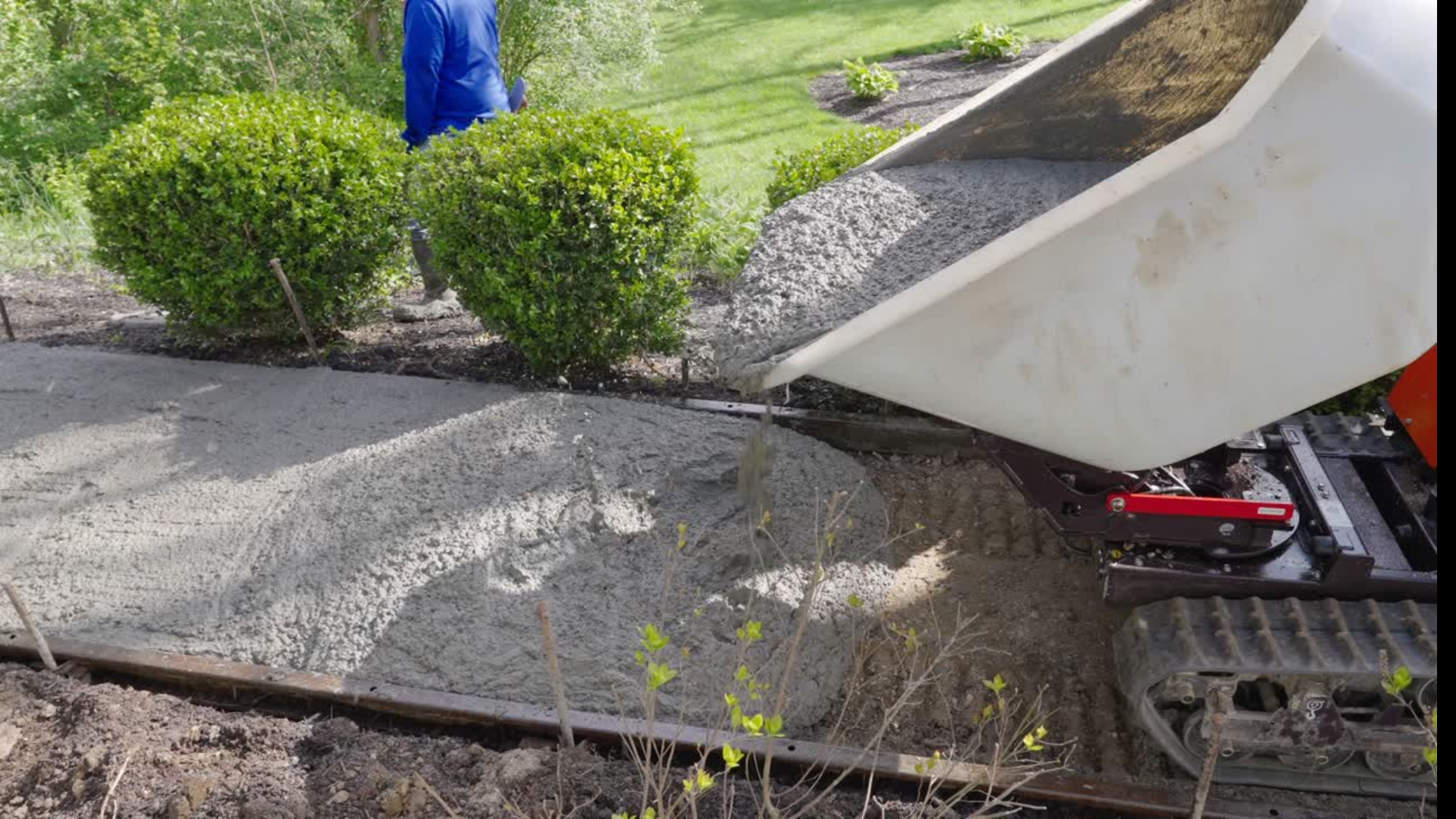 Wheelbarrow tipping Concrete