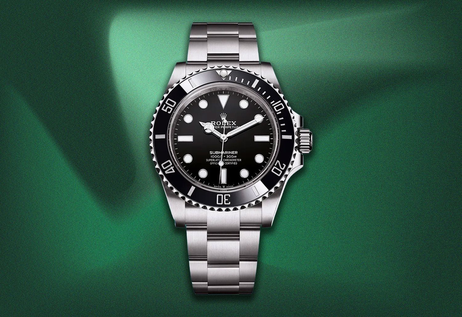 Rolex Submariner watch on a green textured background.