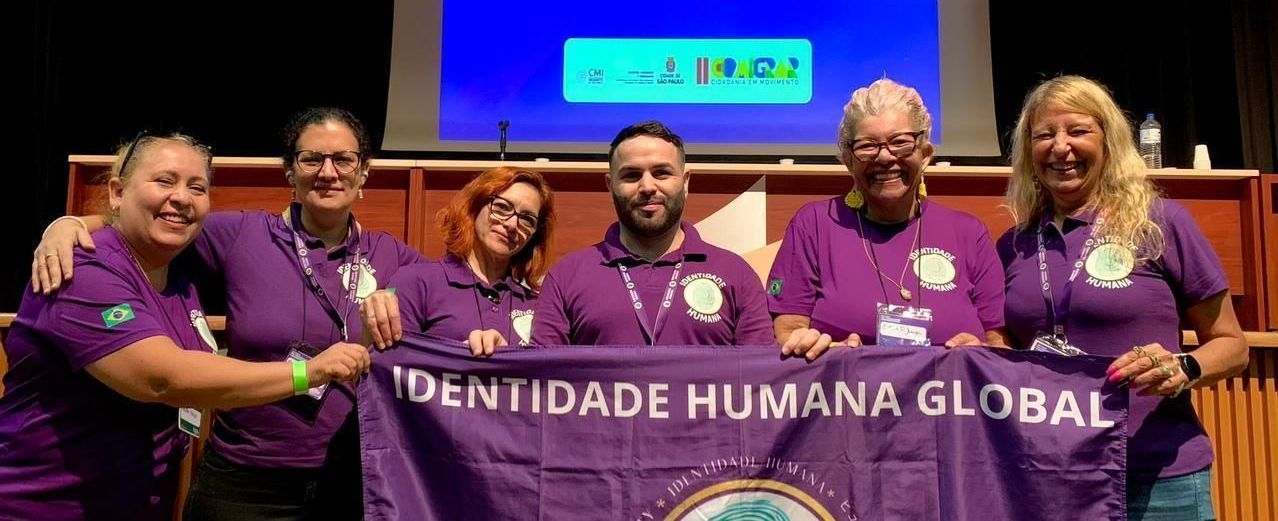 Equipe da Identidade Humana durante conferência livre preparatória para a COMIGRAR