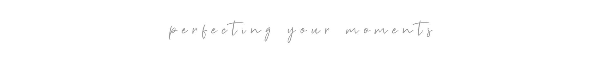 Faint handwritten text on a white background.