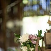 Bouquet of white and pink flowers in a softly blurred indoor setting