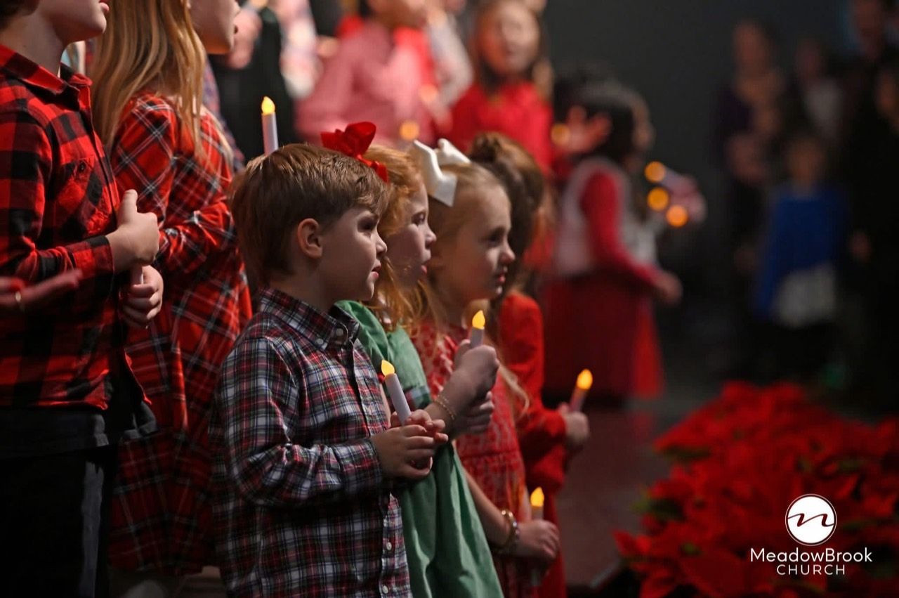 Kids Choir holding candles