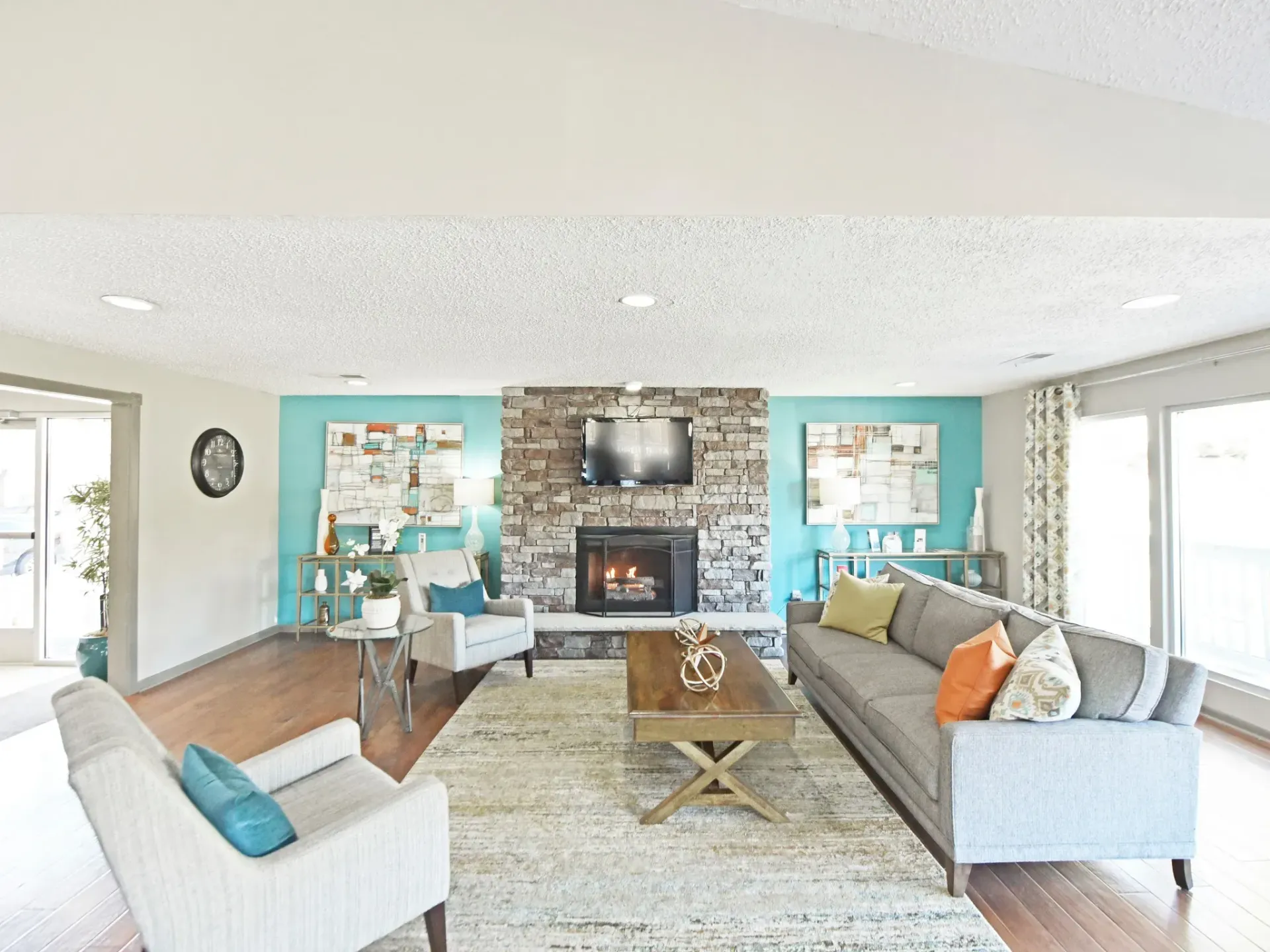 Modern clubhouse room filled with furniture and a fireplace in West Knoxville, TN