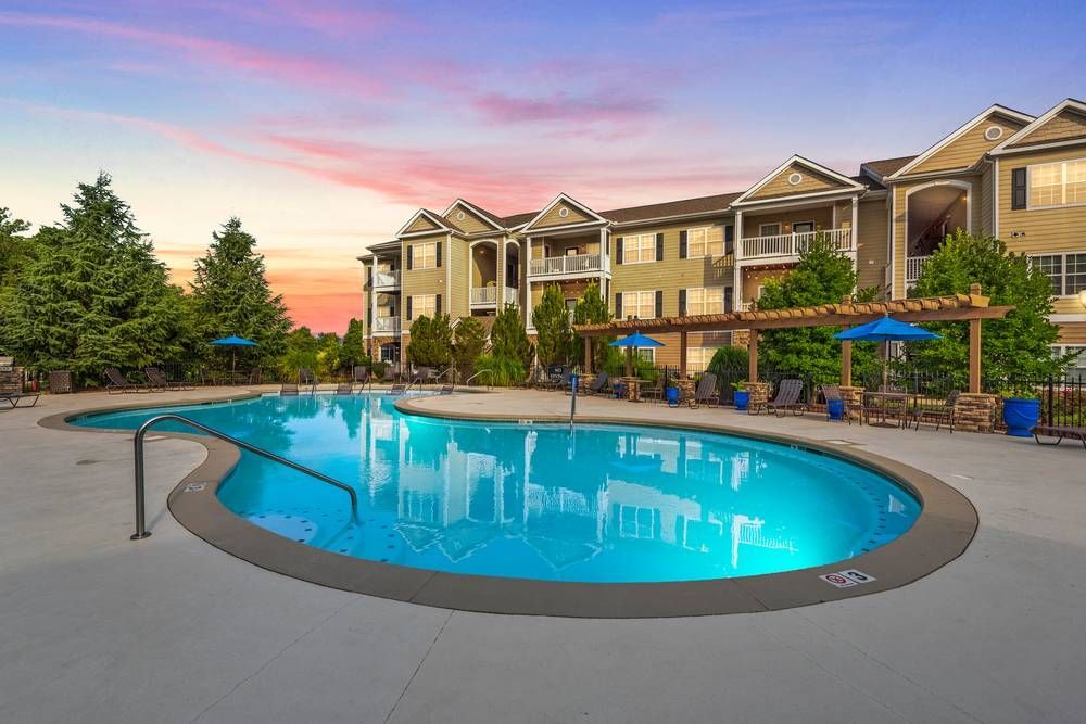 There is a large swimming pool in front of a building, Knoxville, TN