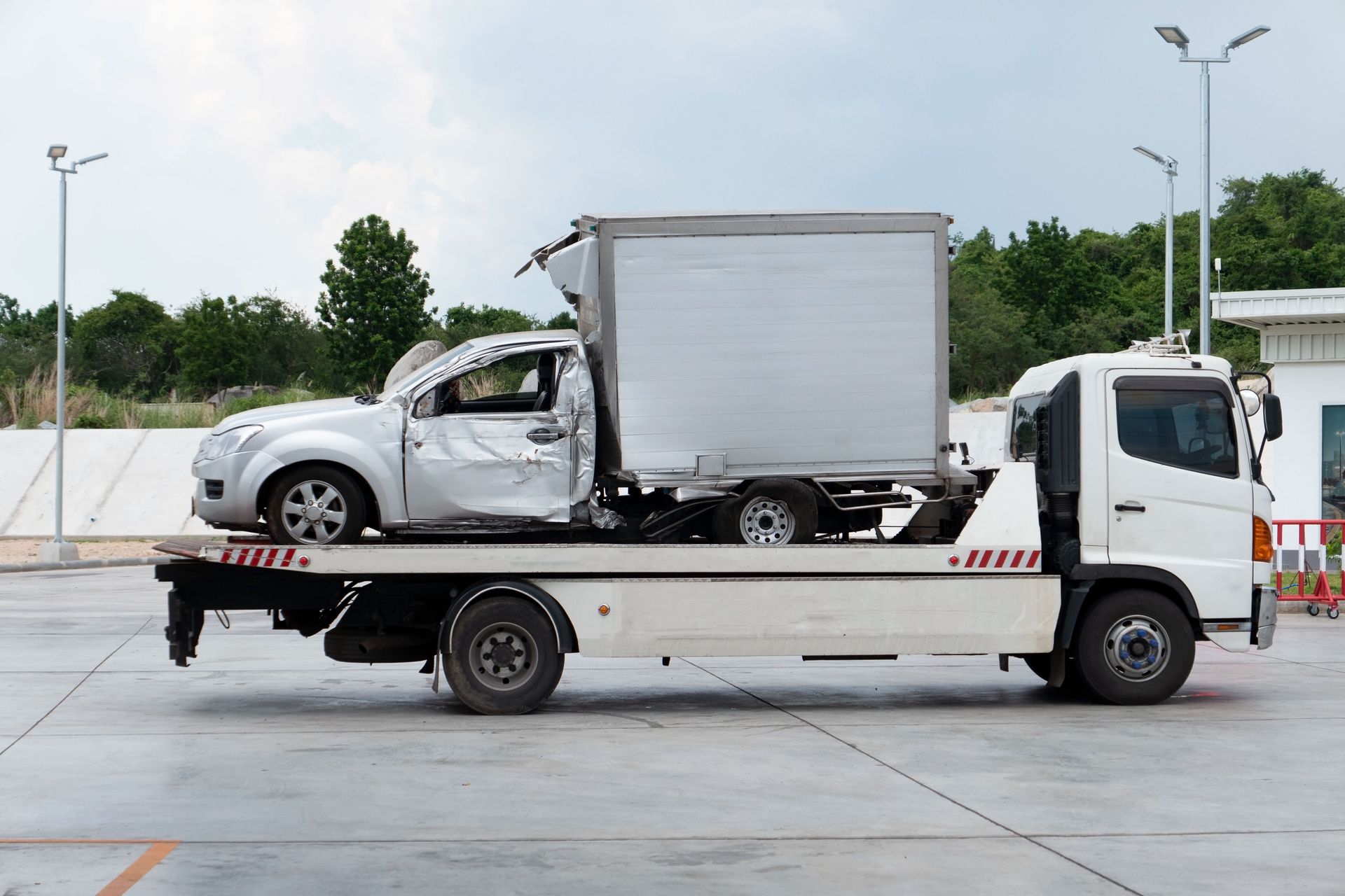 car crash accident on car Towing Truck. And moving to the truck for repair.