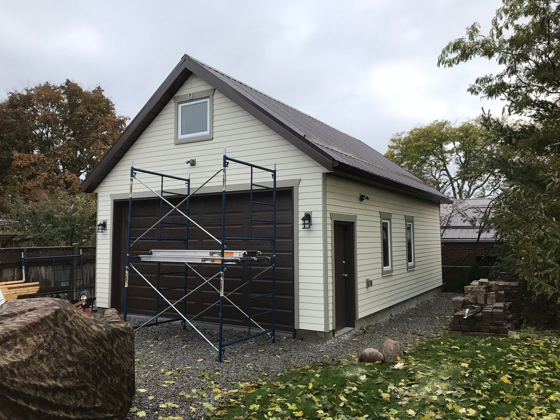 a garage with a scaffolding in front of it
