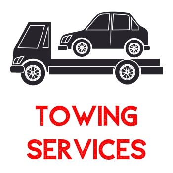 Black tow truck carrying a black car; red