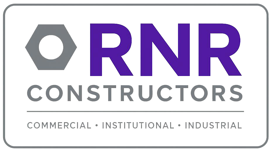Logo for RNR Constructors: purple "RNR" letters, grey hexagon, and text "Constructors" below, with the words "Commercial, Institutional, Industrial" below the company's name.