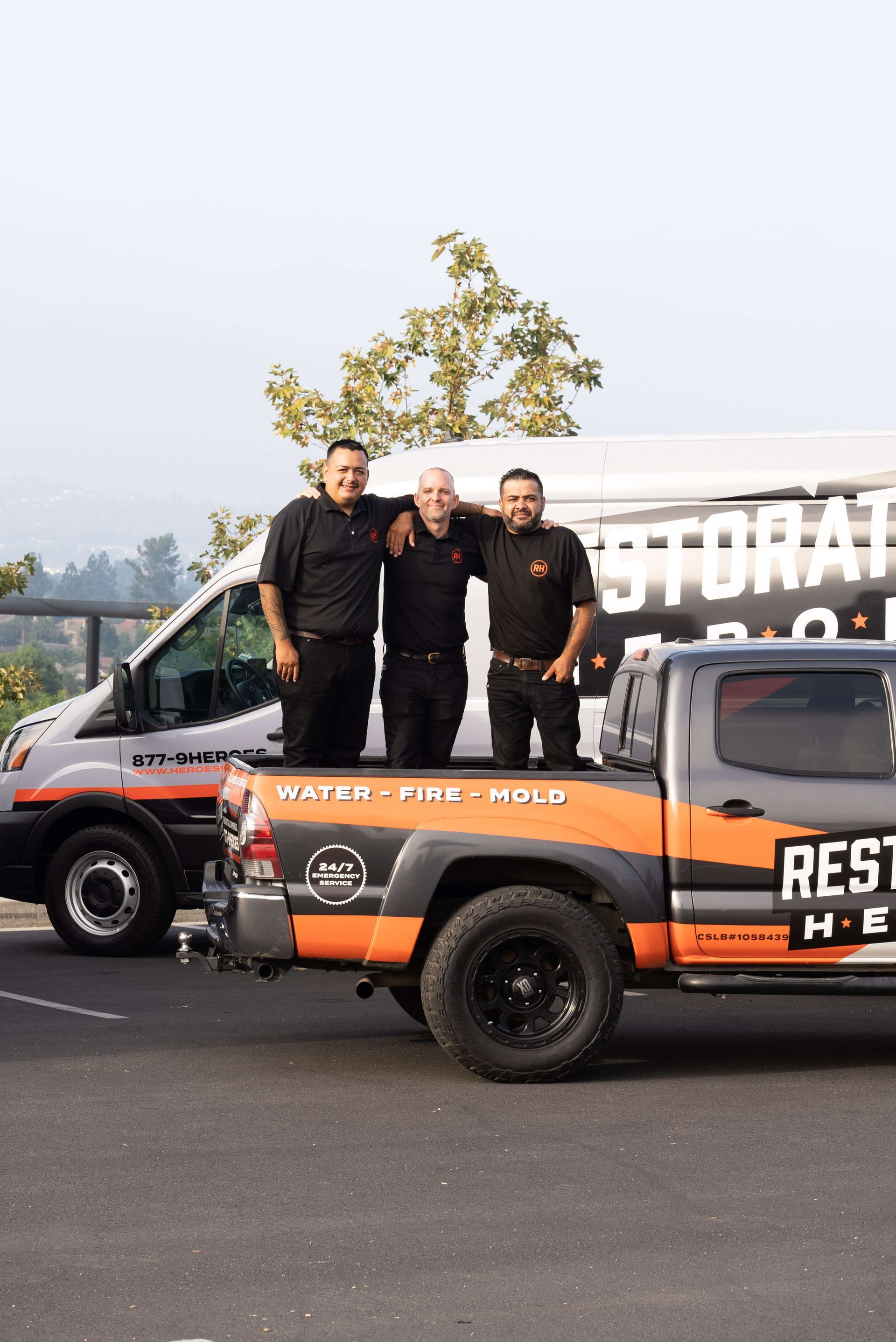 Smoke and odor cleanup service - restoration team van at job site