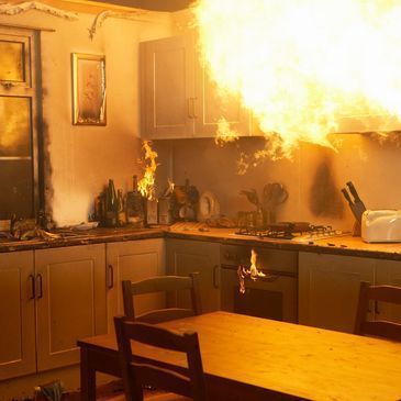 Fire damage restoration service - kitchen damaged by fire