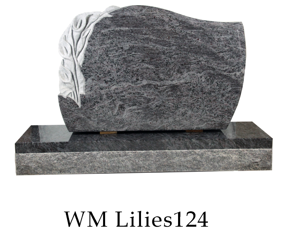 headstone with lilies carved into the left side