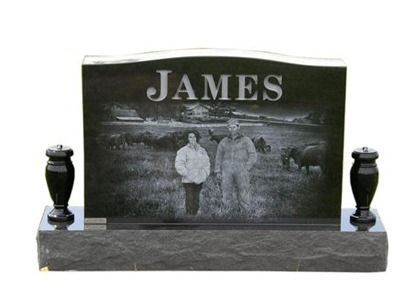 curved headstone with vases