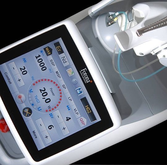A device with a screen that says exomi on it