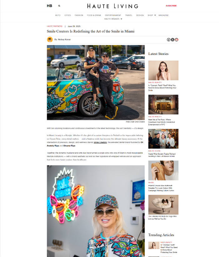 A woman is standing next to a man in a colorful car on a website.