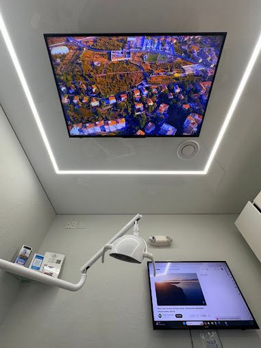 There is a picture of a city on the ceiling of the room.