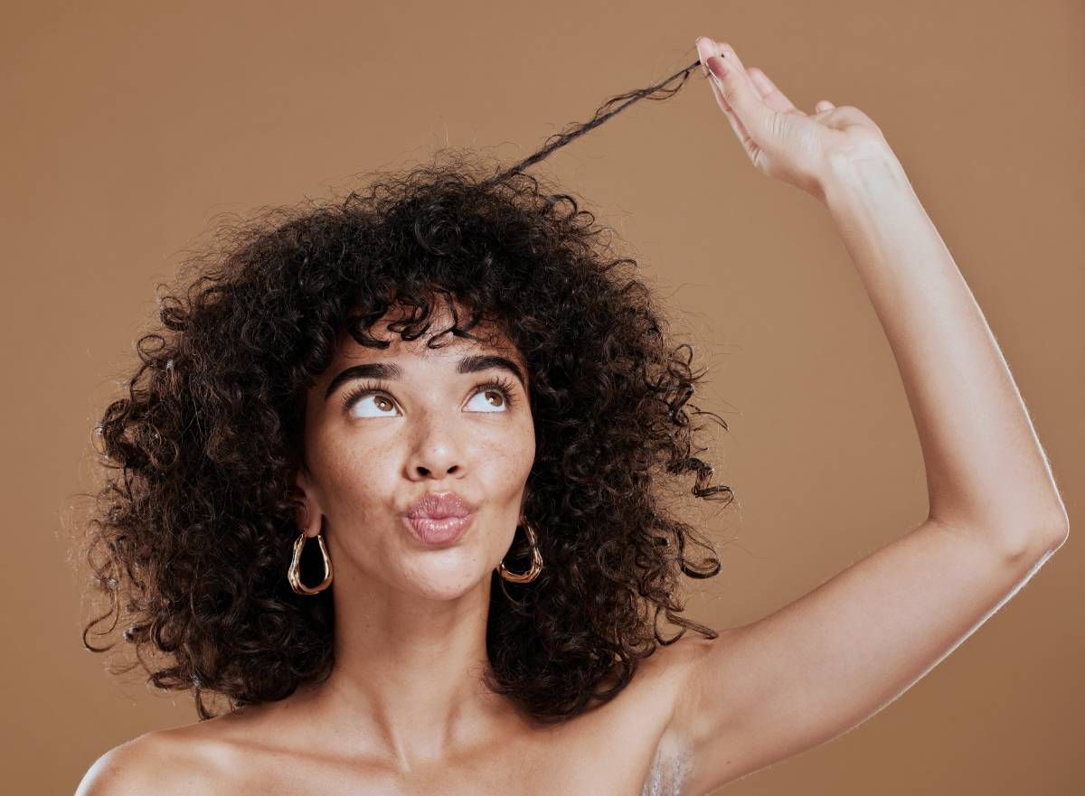 Someone wondering about what type of hair they have at Lux Hair Bar in Lexington, Kentucky