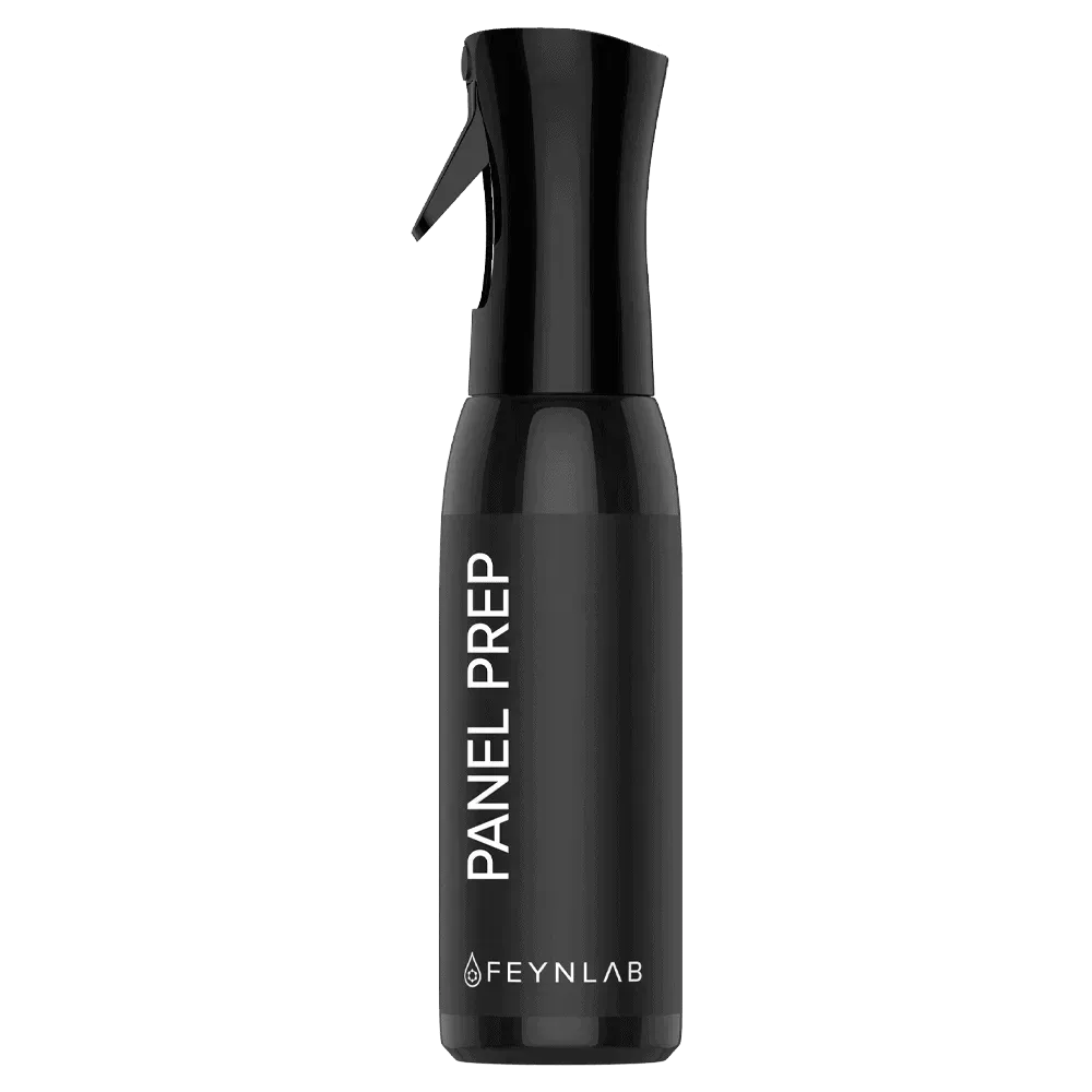 Black spray bottle labeled