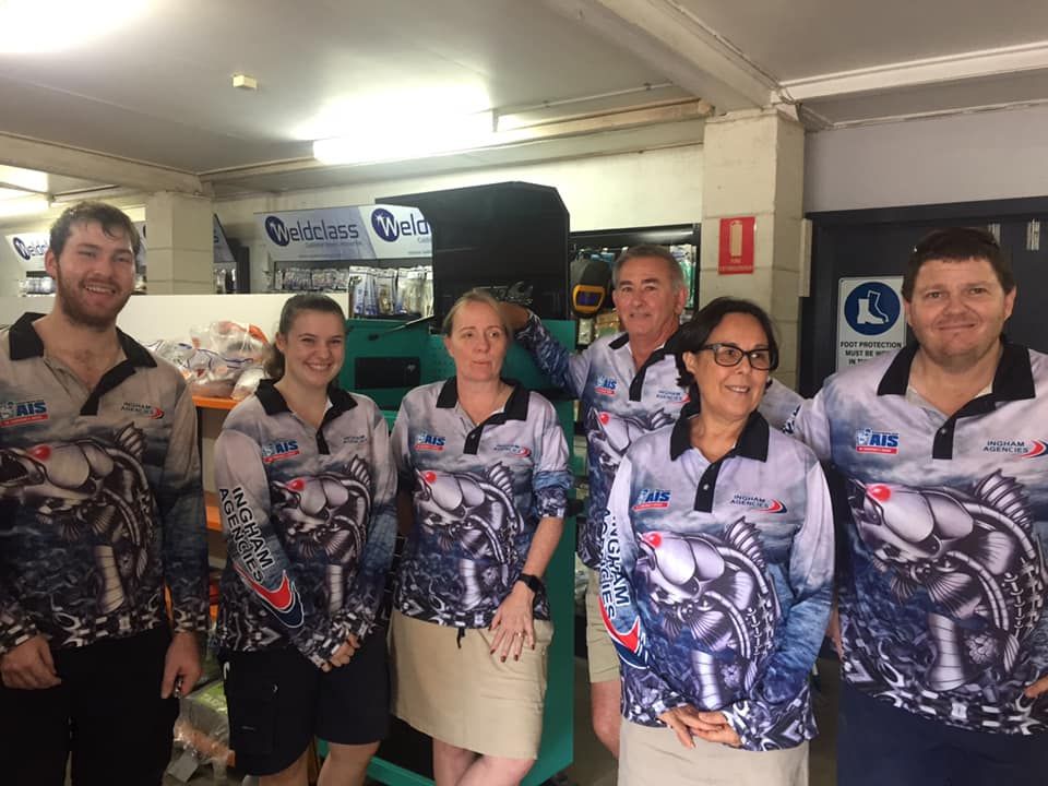 Six People in Matching Blue and Grey Patterned Work Shirts — Ingham Agencies in Ingham, QLD