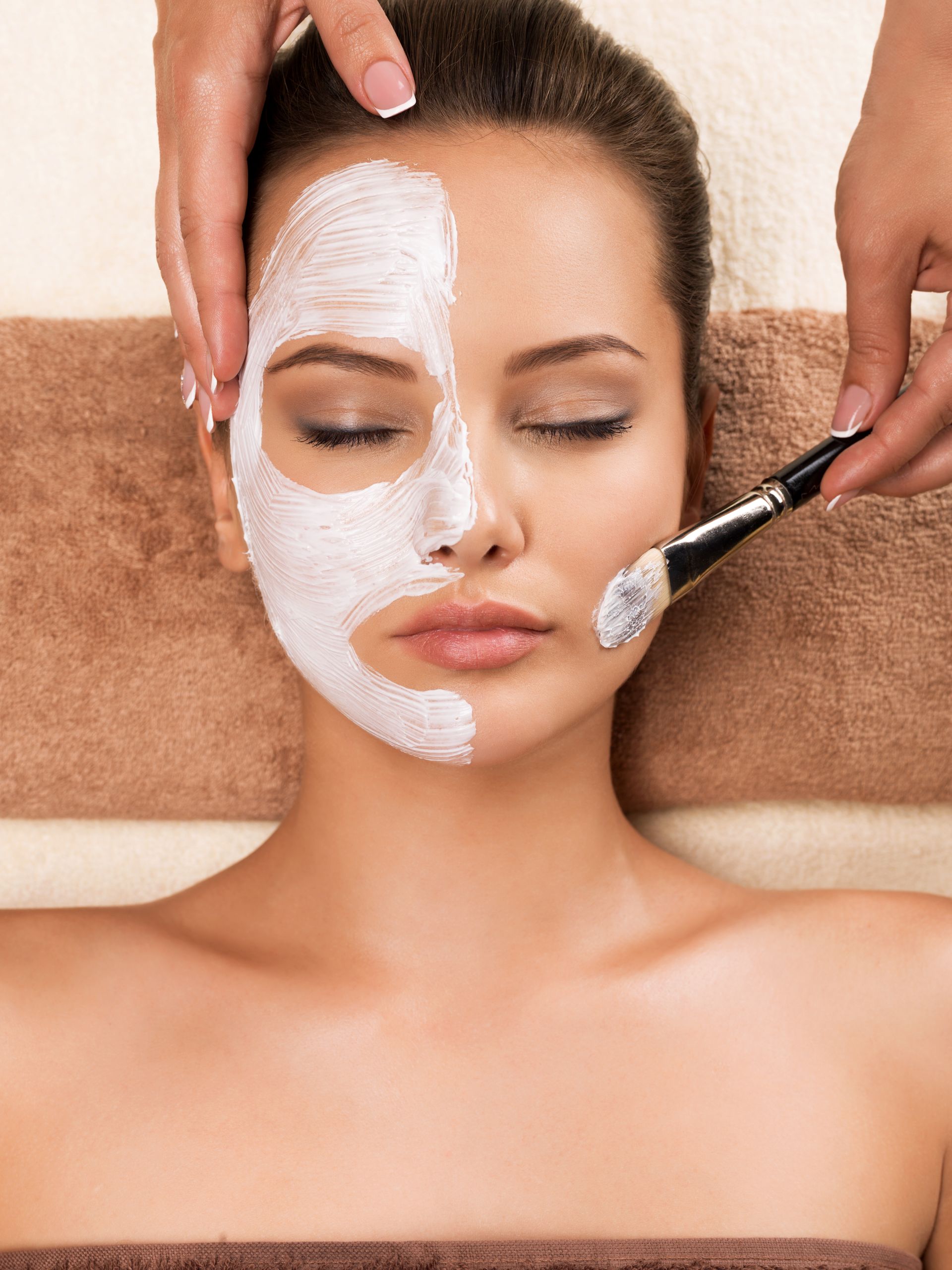 Woman getting diamond glow facial