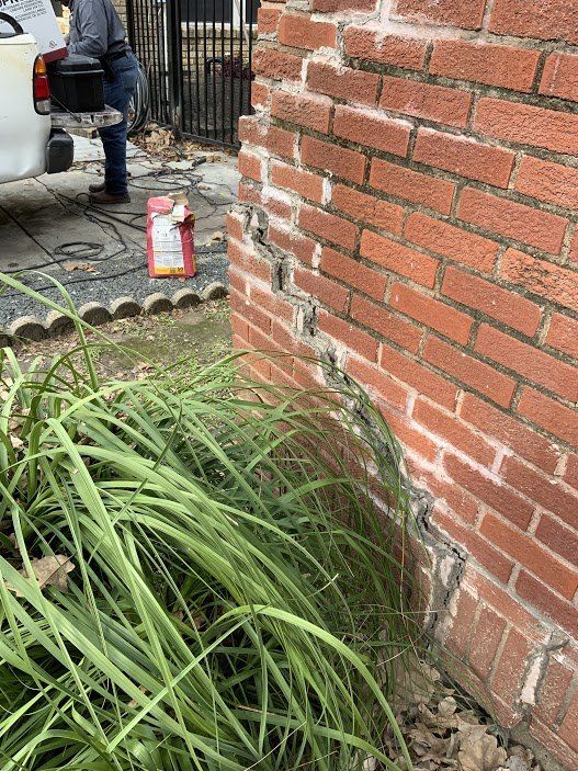 Cracks in brick due to foundation damage