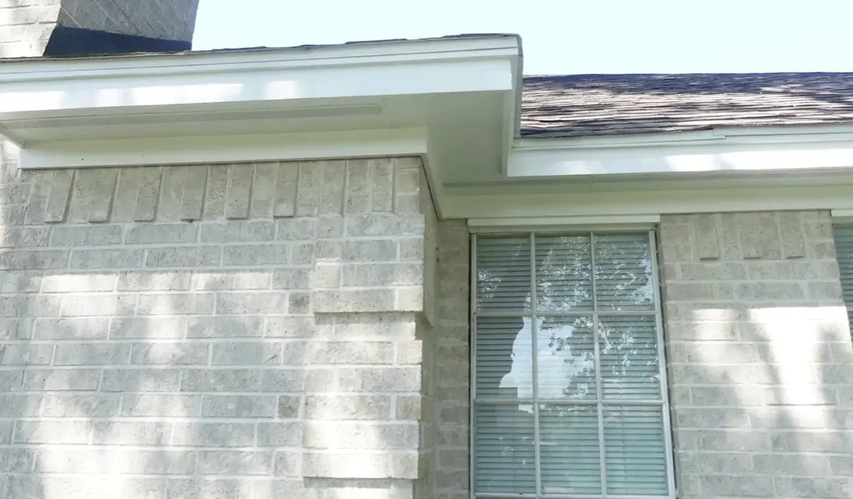 Stair step cracks in brick exterior from foundation issues when buying a house