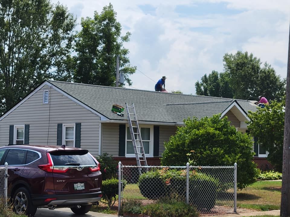 Workers Working on the Roof — Kingsport, TN — McMurray Boy's Roofing