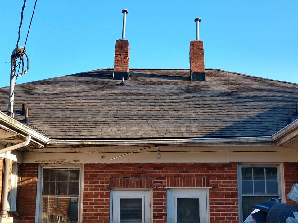 Brick House with Two Chimney — Kingsport, TN — McMurray Boy's Roofing