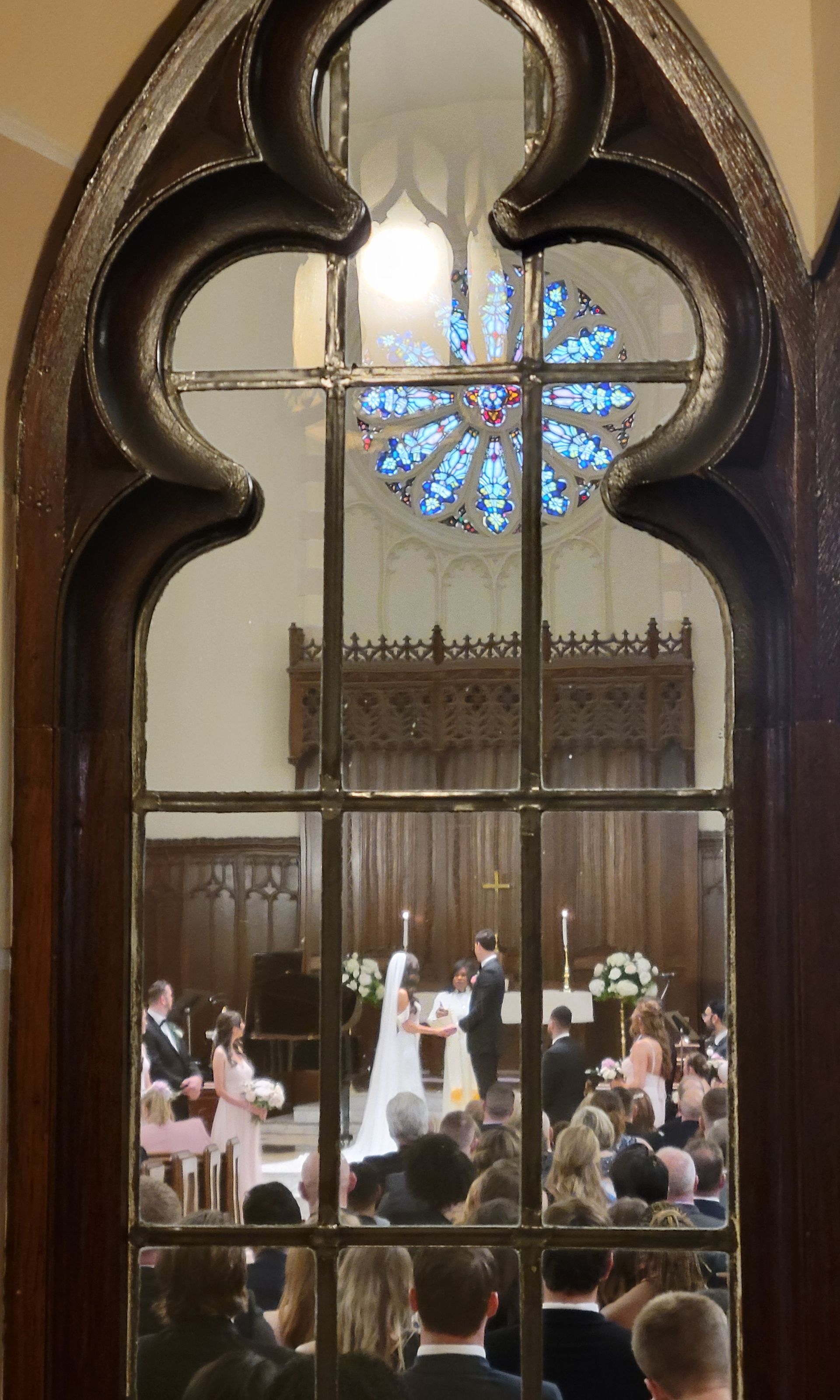 A bride and groom are getting married in a church