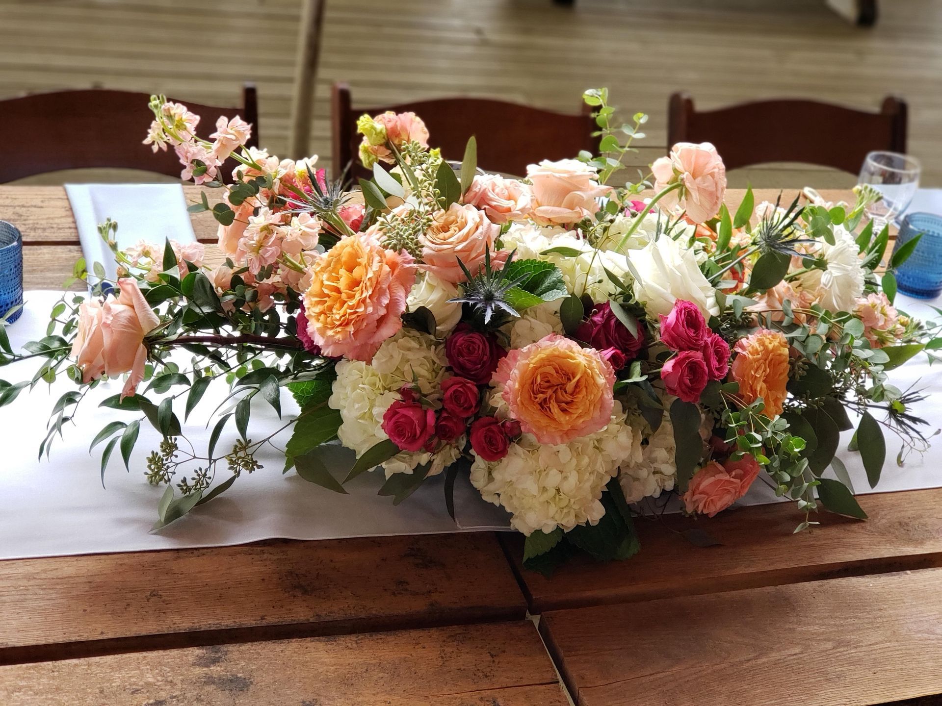 A table with a bunch of flowers on it