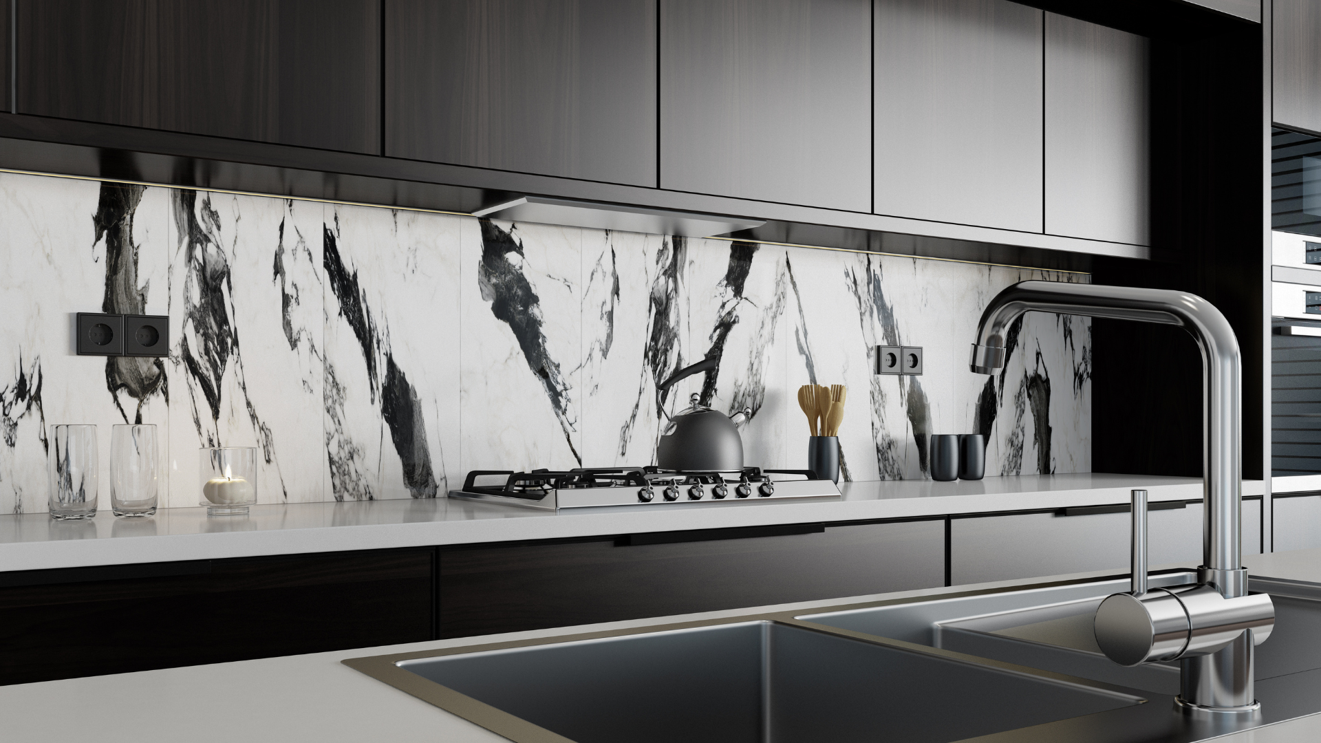 A kitchen with black and white cabinets and a sink.
