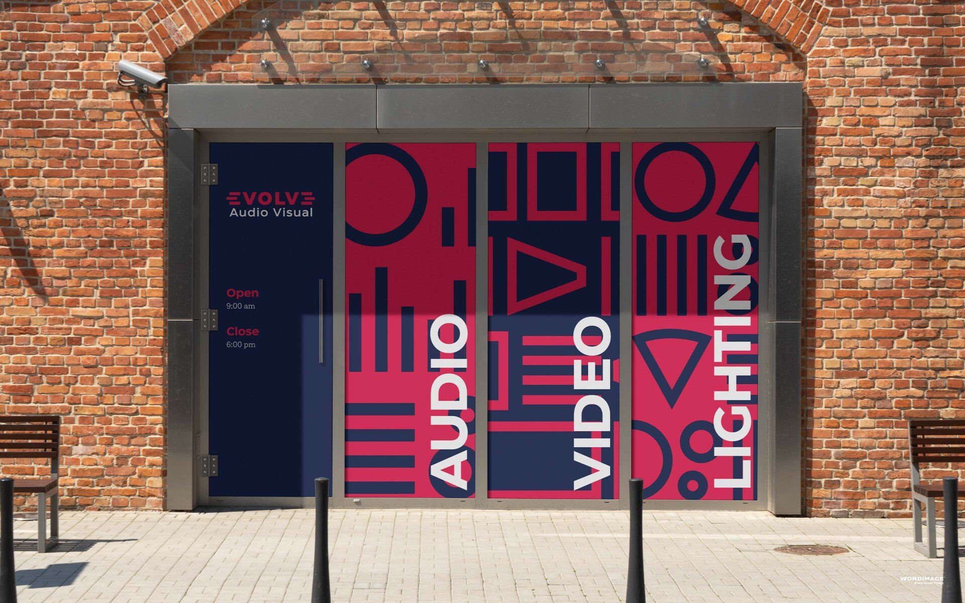 A brick building with a sign that says audio live video and lighting