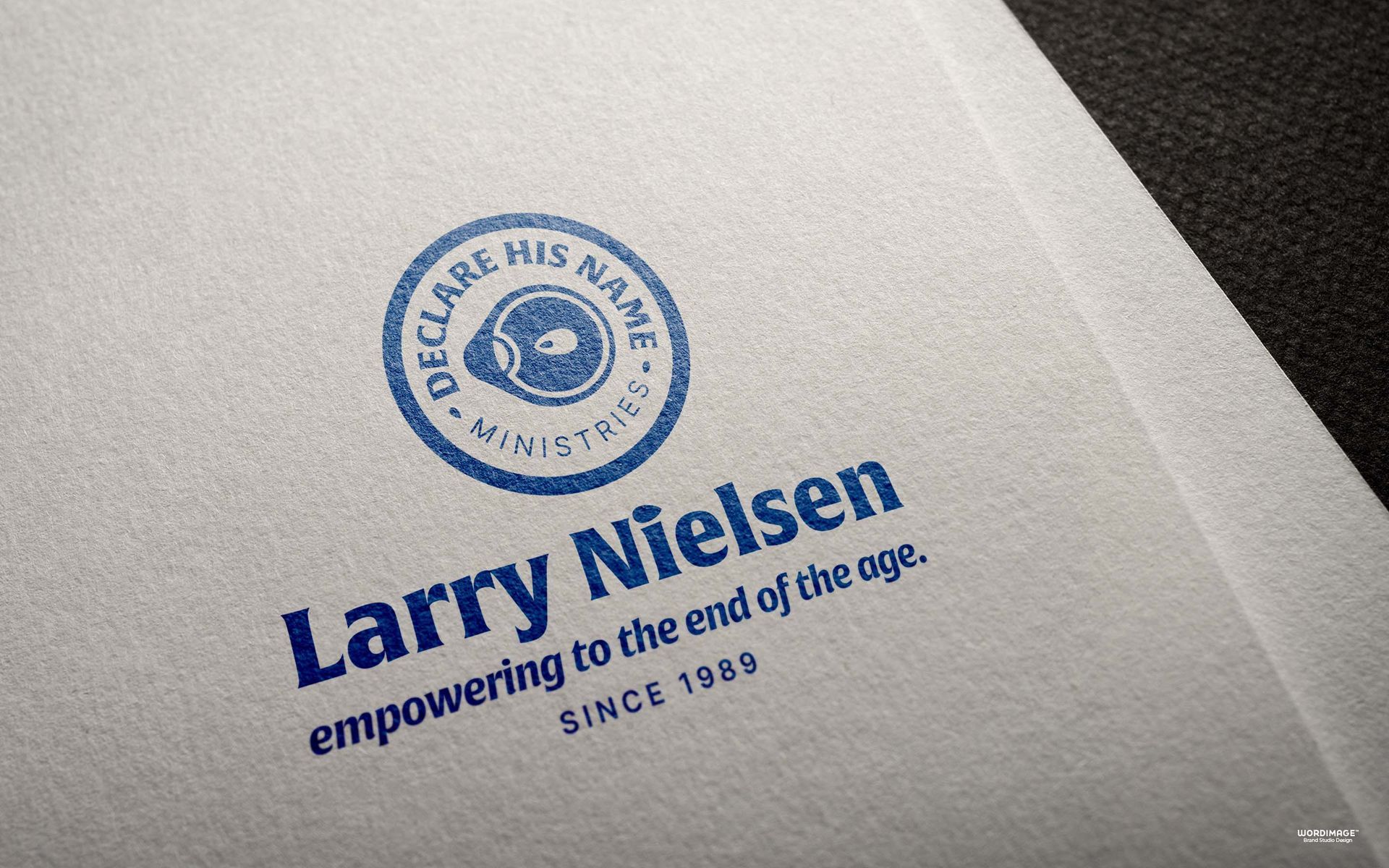 The name larry nielsen is on a piece of paper
