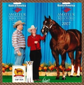 Two people in cowboy hats stand beside a horse at the Bank of America Amateur World Show 2007.
