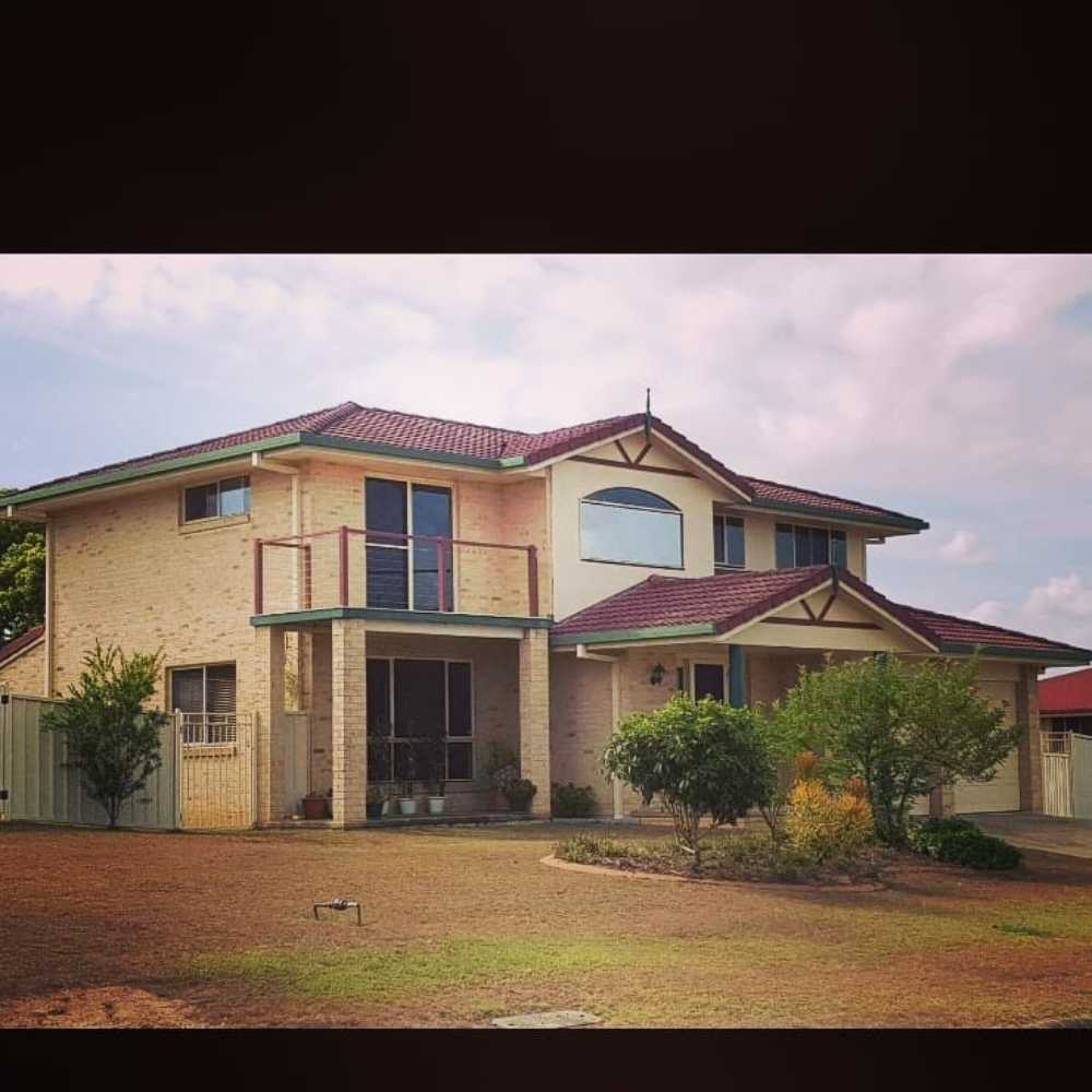 Home With Large Tinted Bay Window — Darkstyle Tinting in South Lismore, NSW