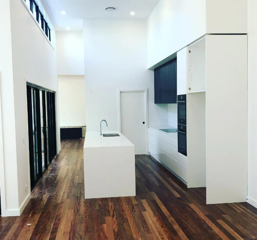 Newly Installed Lighting On A Kitchen