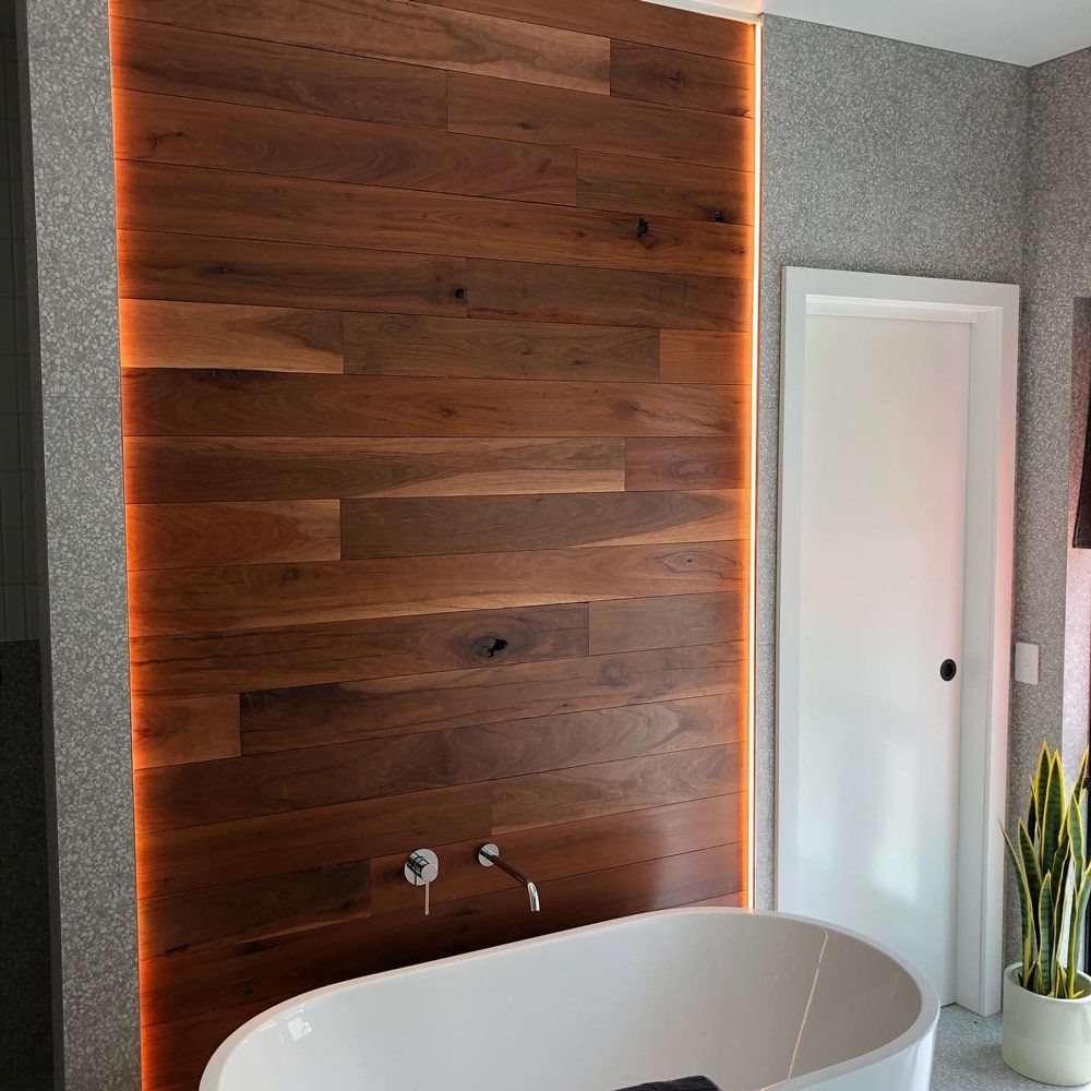 Wooden Panel with Lighting on A Modern Bathroom