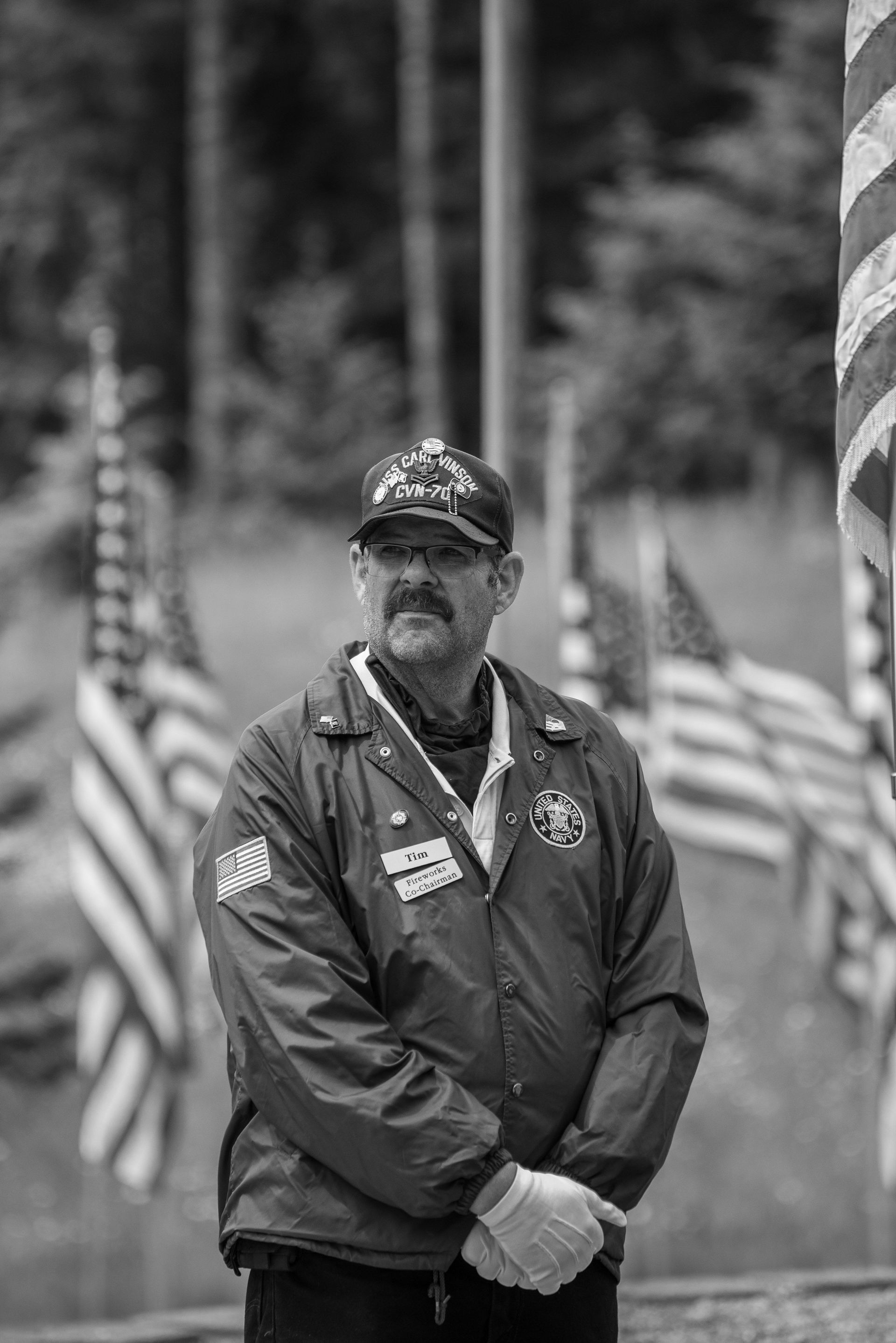 Two veterans speaking supportively outdoors