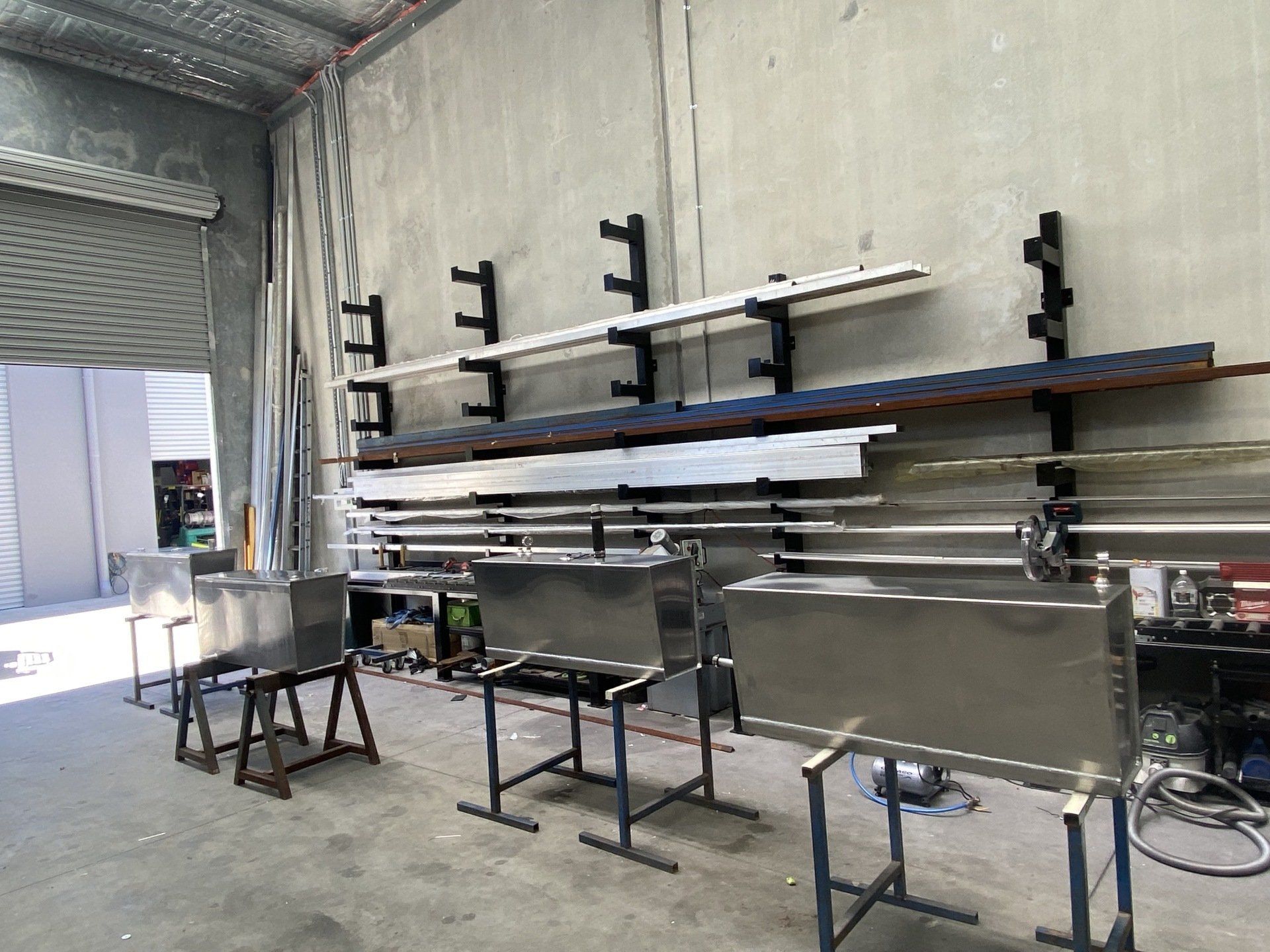 Metal Works Sheets Display on Wall — EB Metalworks in Somersby, NSW